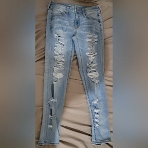 Light blue American Eagle distressed jegging jeans in size 10 Regular